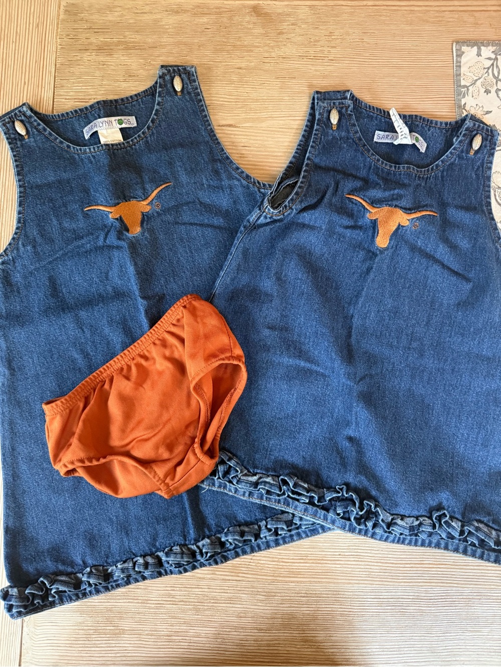 Matching set of girls Longhorn dresses with a pair of 6T Nike bloomers, 4T, 6/7
